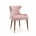 Sedia in velluto rosa con gambe in legno e ottone